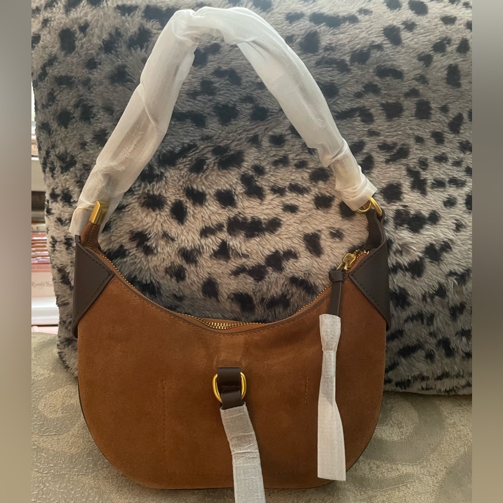 Cupcakes 🧁 and Cashmere Vintage Cowhide Crescent Bag